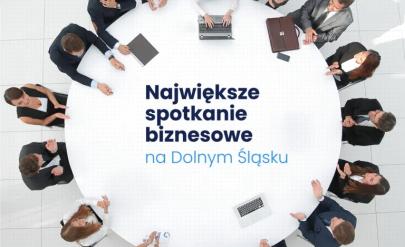 Grupa osób siedzi przy okragłym stole. Napis: Business Mixer Największe spotkanie networkingowe na Dolnym Śląsku.