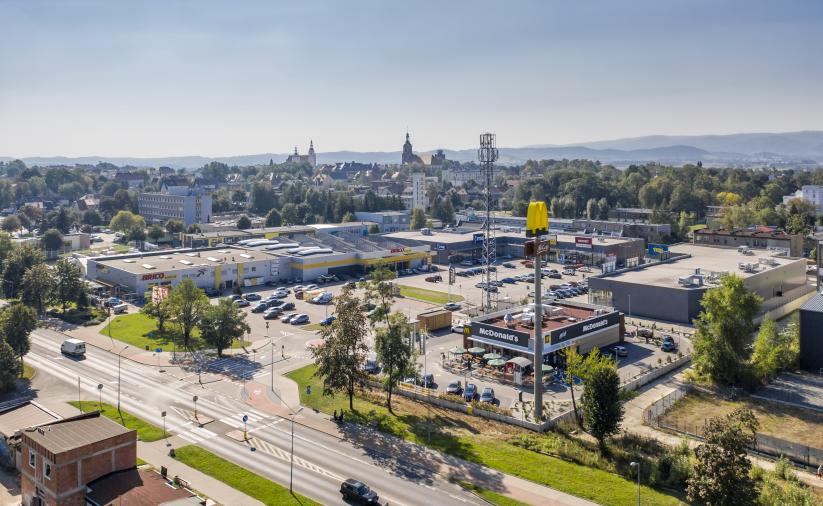 Cityscape showing buildings and a retail park