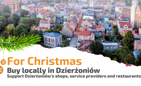 Photo of Dzierżoniów - bird's eye view. At the bottom, two baubles and the inscription "Buy locally in Dzierżoniów for Christmas. Support Dzierżoniów's shops, service providers and restaurants!"